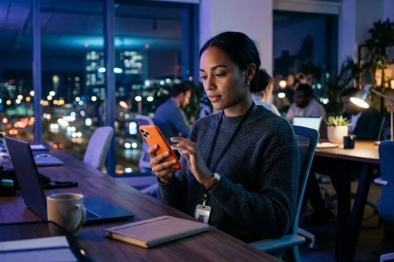 employee using phone on vpn